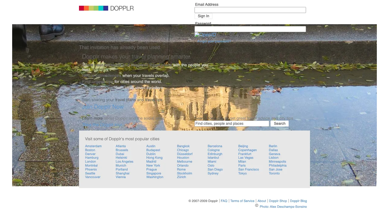 The dopplr.com homepage in 2009, with its rainbow wordmark, a photographic header, and a grid of popular cities from Amsterdam to Toronto